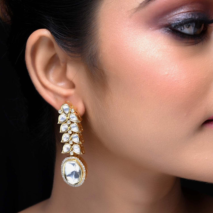 Gold plated earrings with intricate Kundan and Polki detailing for a luxurious look