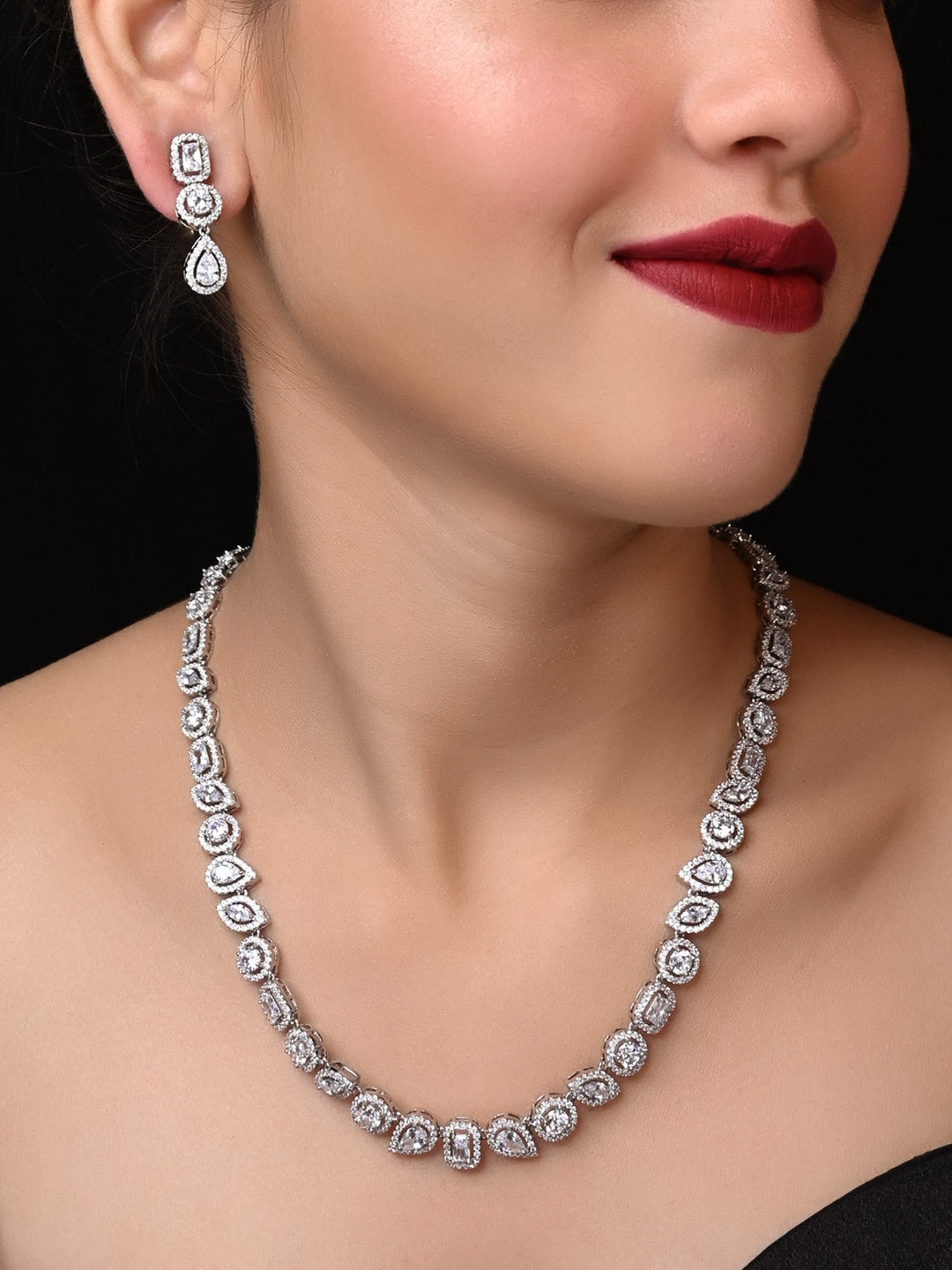 Beautiful Neya silver plated necklace set with sparkling American diamond accents