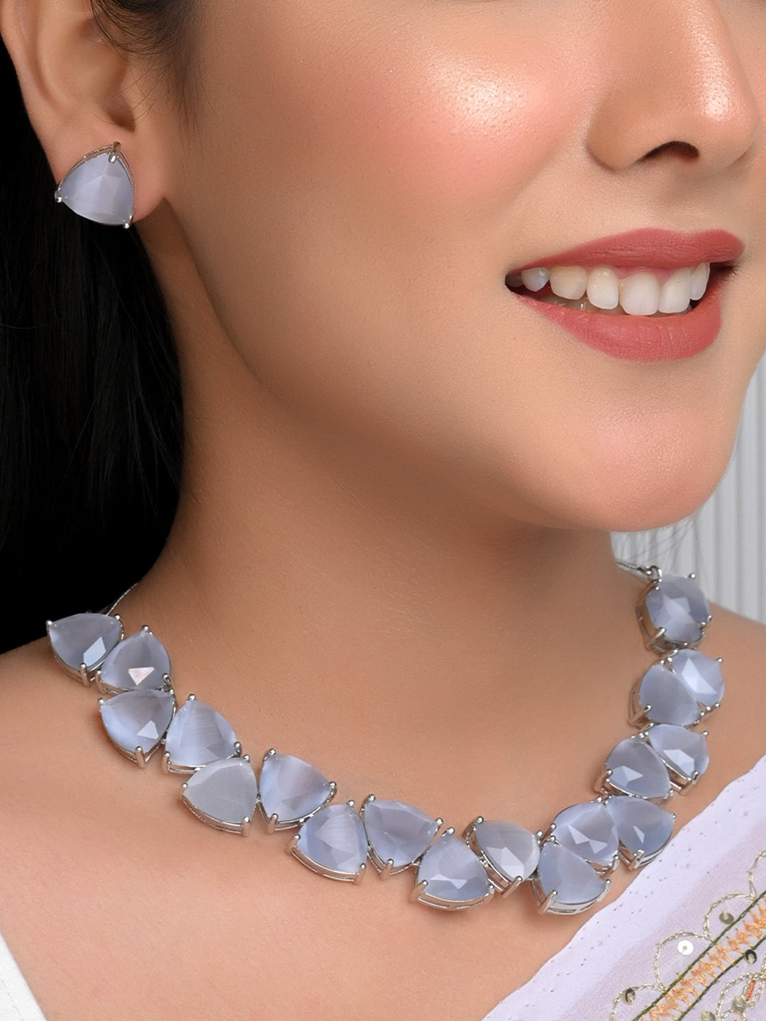  Beautiful American Diamond jewelry set featuring triangle shape for a contemporary look 