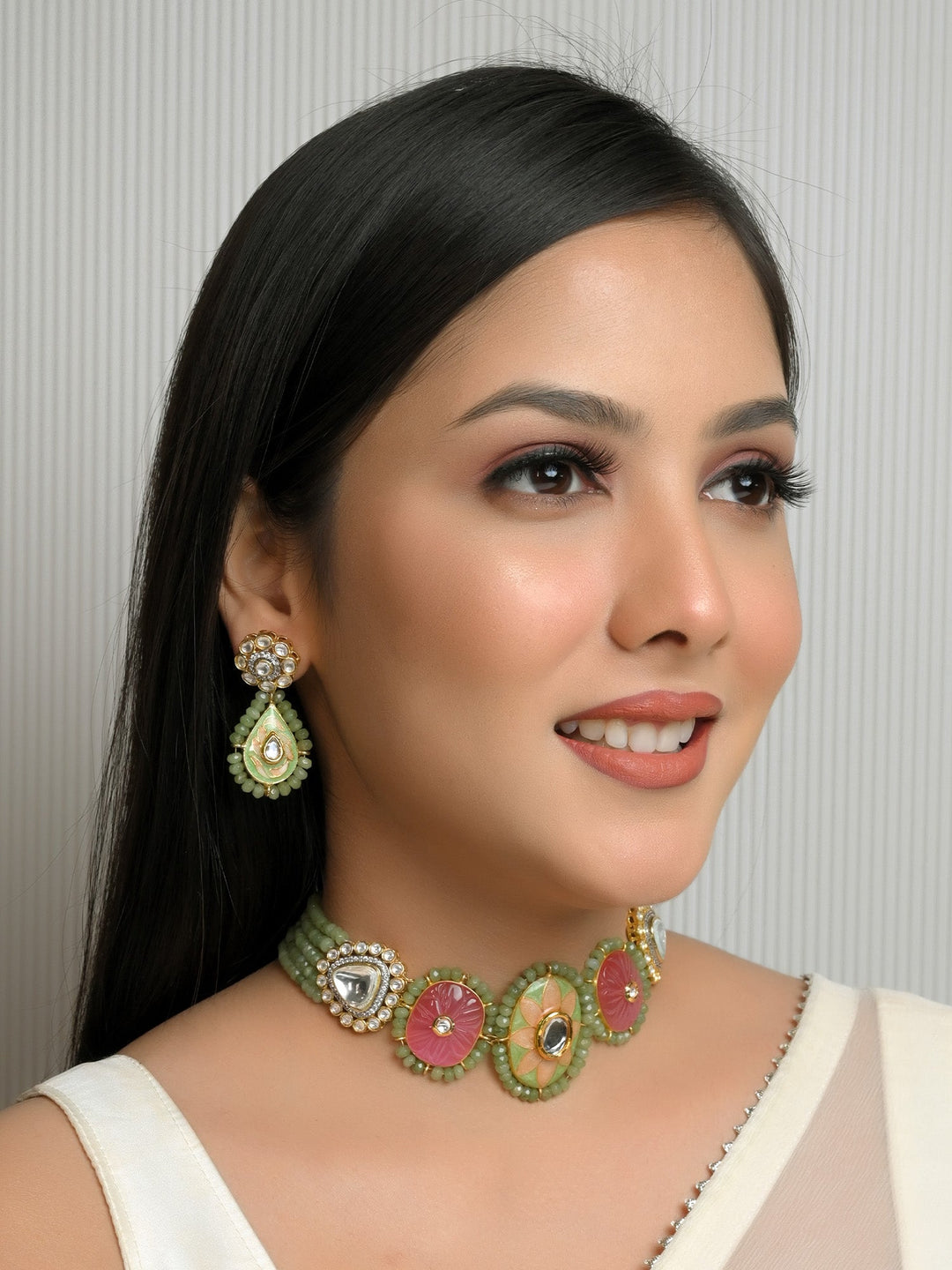 Ruhu P & G Meenakari Choker Set in vibrant colors and intricate designs