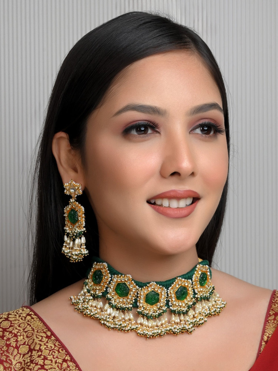 Green velvet cloth with traditional Paachi Kundan choker and earrings 