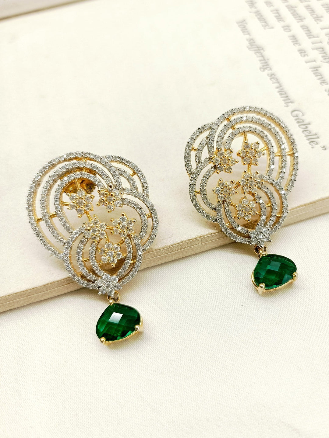  Beautiful gold plated earrings with American diamonds and a stunning green emerald stone 