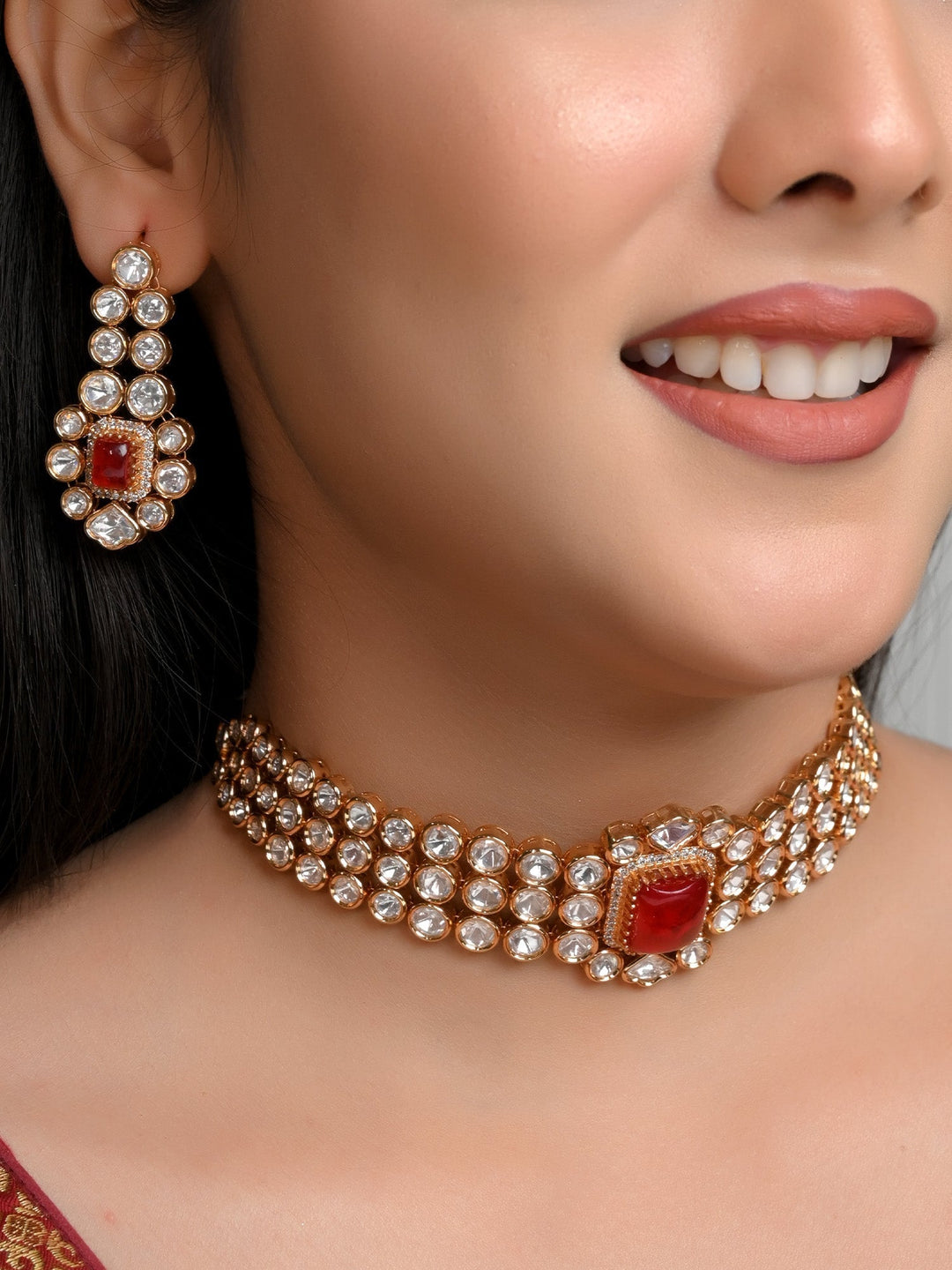  Elegant red Kundan choker and earrings set for special occasions 