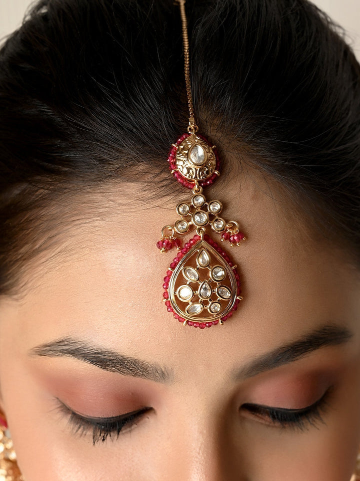 Sparkling Kundan stones with gold plated brass metal jewelry set