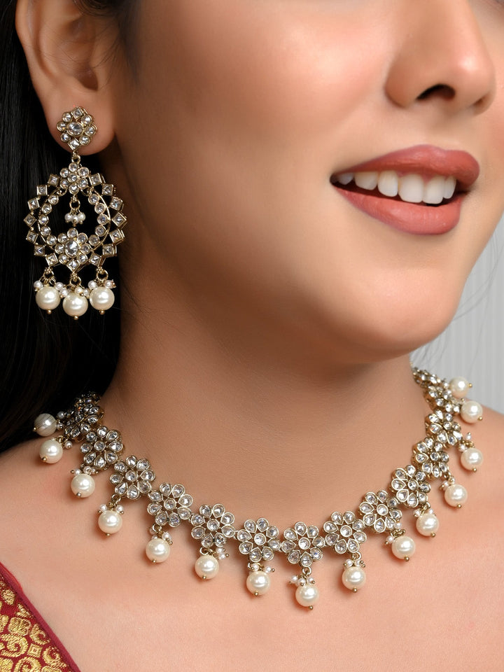 Anokhi White Polki Necklace Set with intricate design and sparkling stones