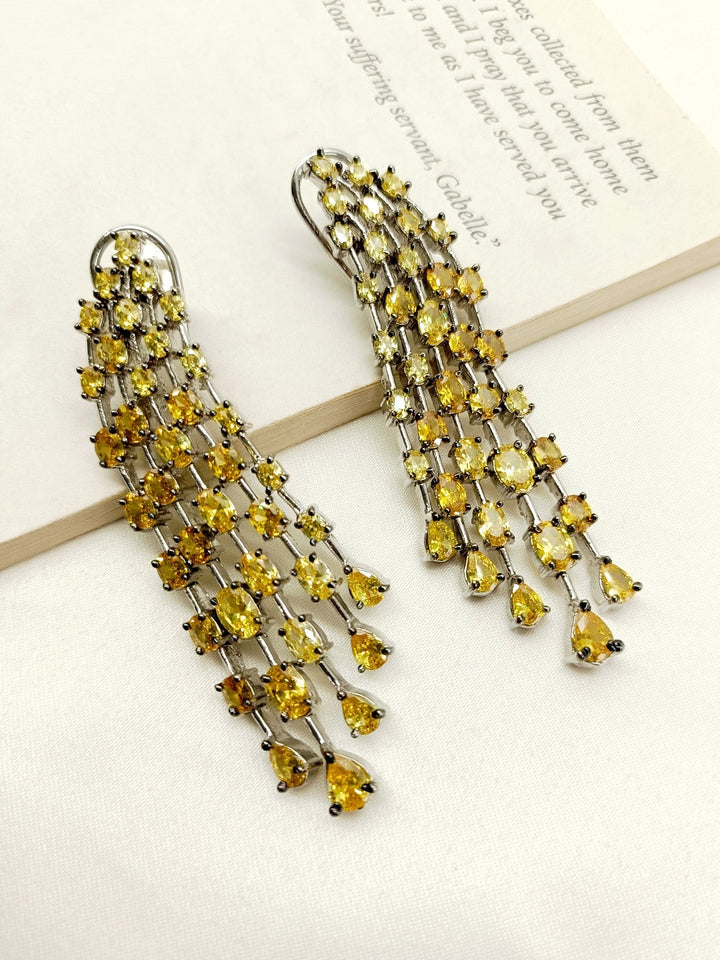 Silver finish American diamond earrings in yellow with citrine stone, a smart and stylish accessory for Western outfits