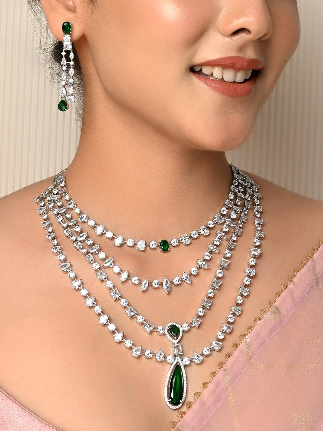 Luxurious accessory featuring a beautiful blend of emerald stone and American diamonds