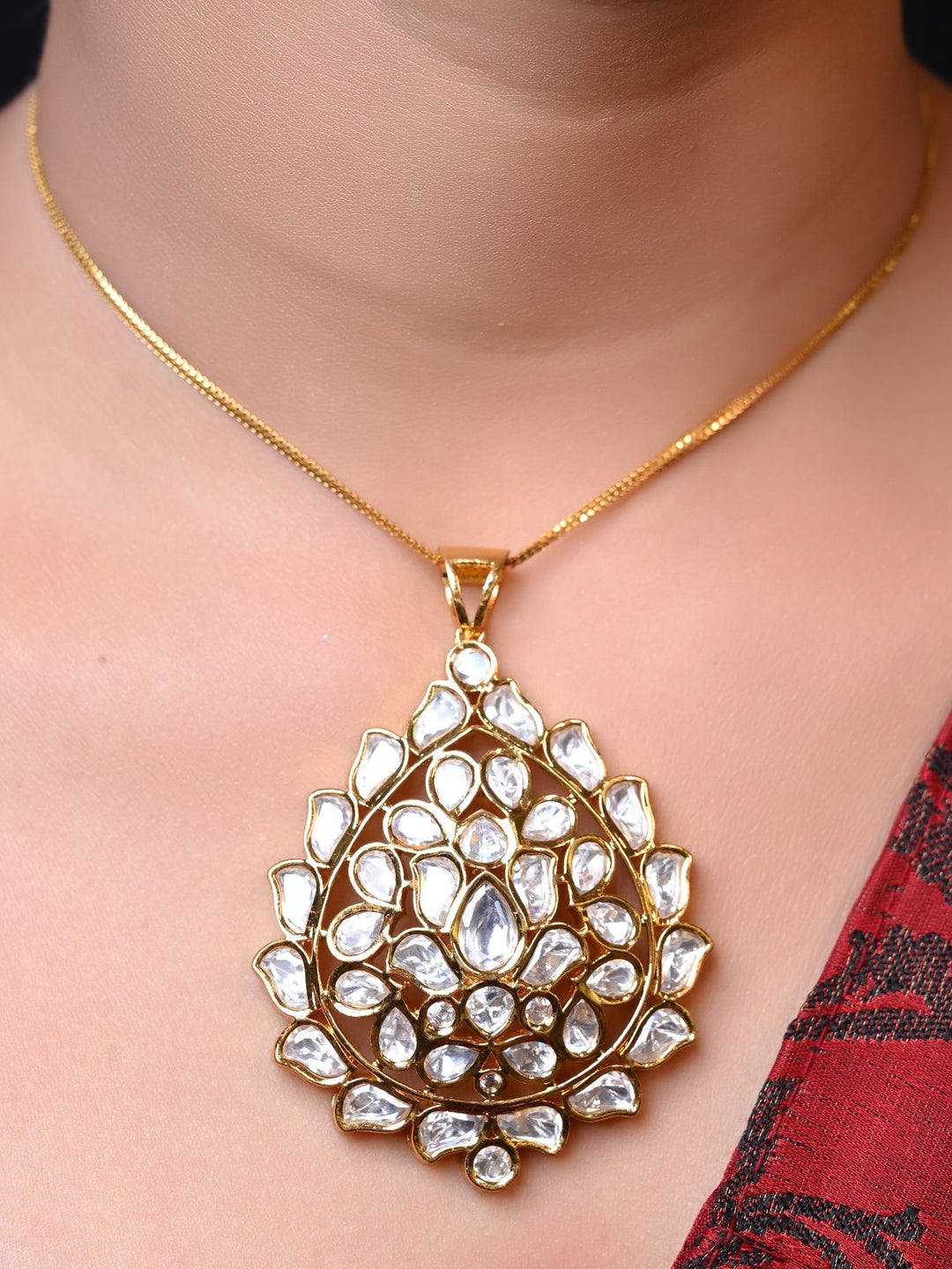  Exquisite Pranshi White Kundan Pendant Set with detailed kundan setting and brass metal base 