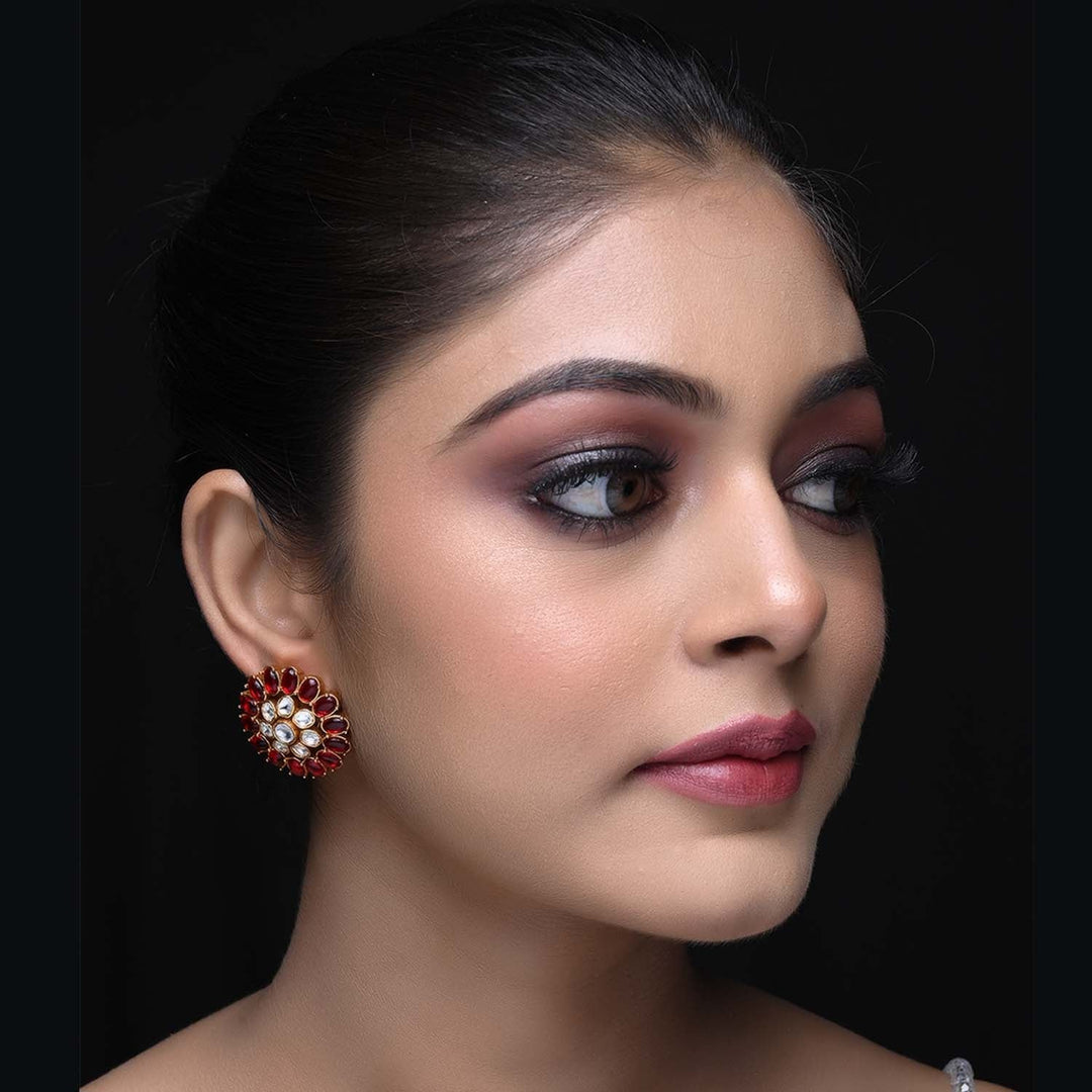 Beautiful maroon and gold plated Kundan tops with traditional design and colored stones