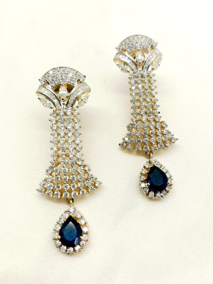 Elegant American diamond earrings featuring beautiful blue sapphire stone