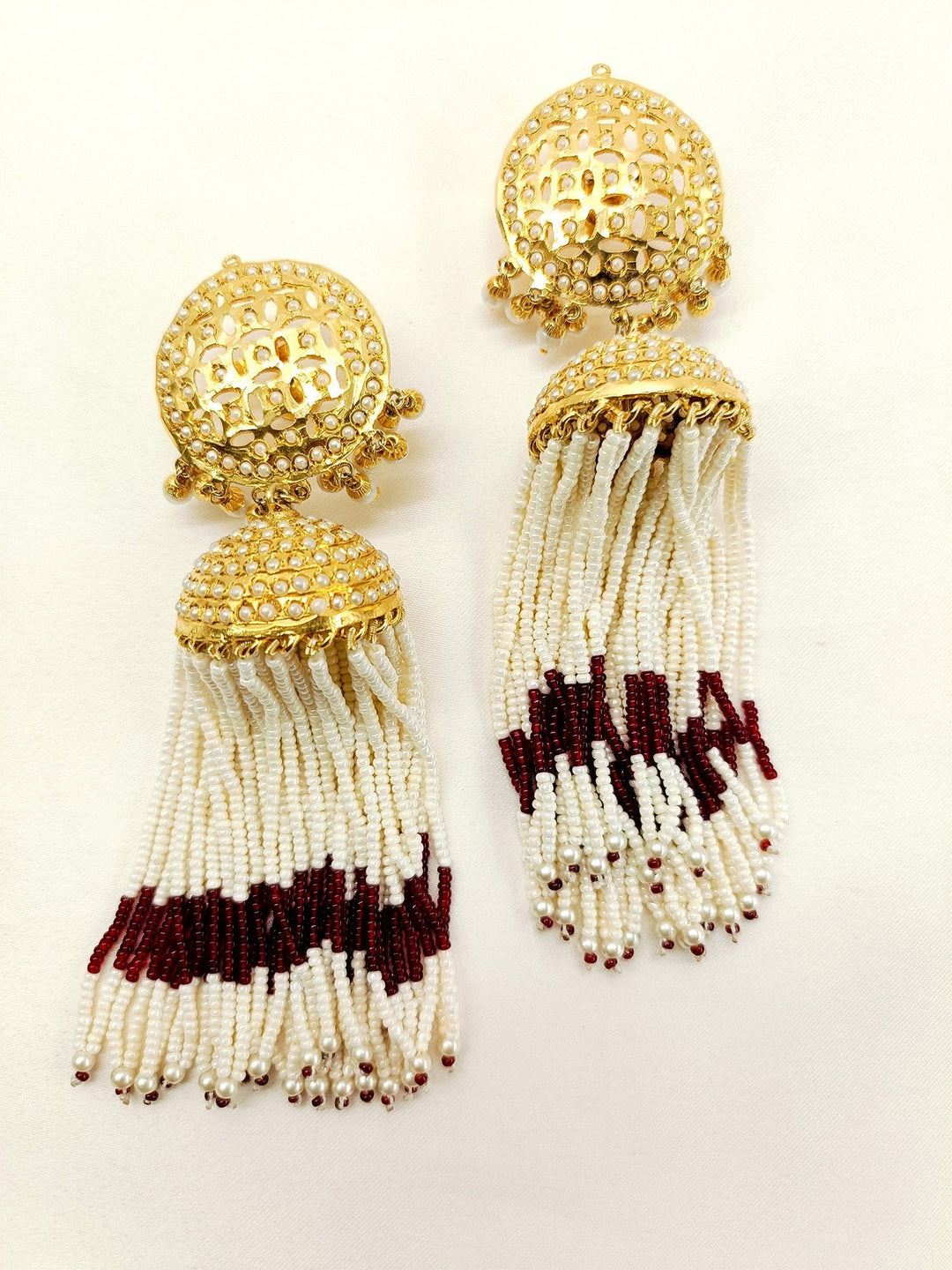 Exquisite Kaashni Maroon Jadau Jhumki with intricate design and intricate craftsmanship