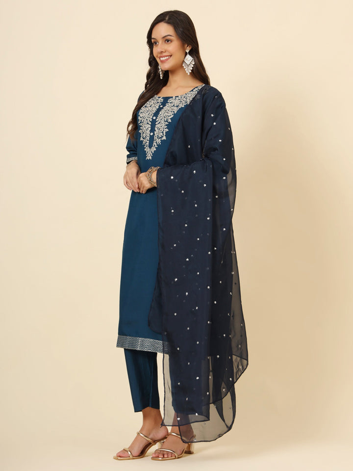 Blue silk pant suit with intricate embroidery and matching dupatta