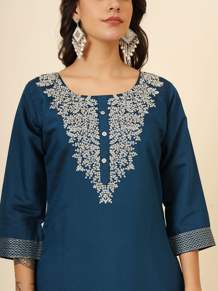 Beautiful blue silk pant suit with intricate embroidery and matching dupatta