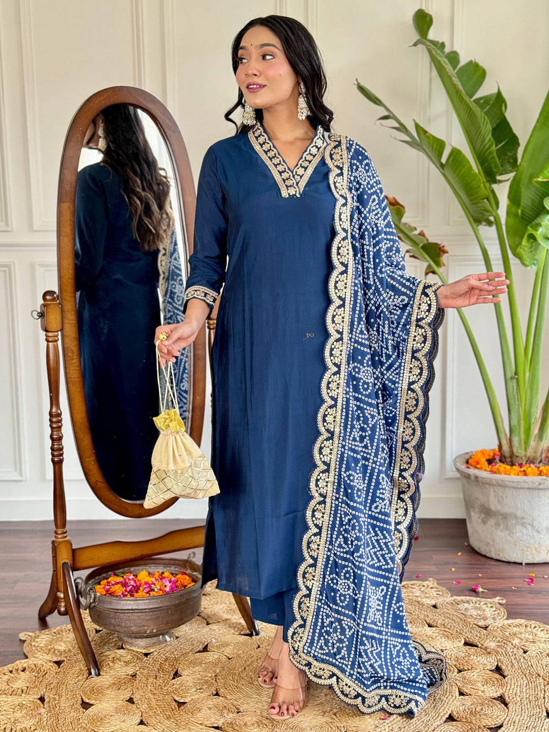Rich blue pantsuit with fine detailing, perfect for festivals and special events
