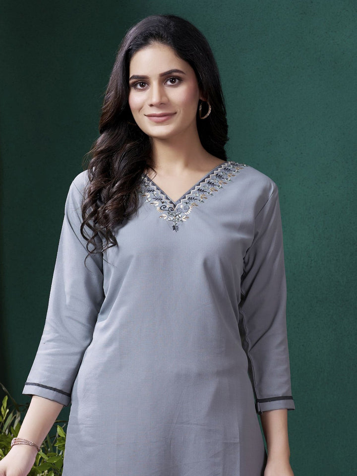Elegant grey cotton suit with intricate embroidered work
