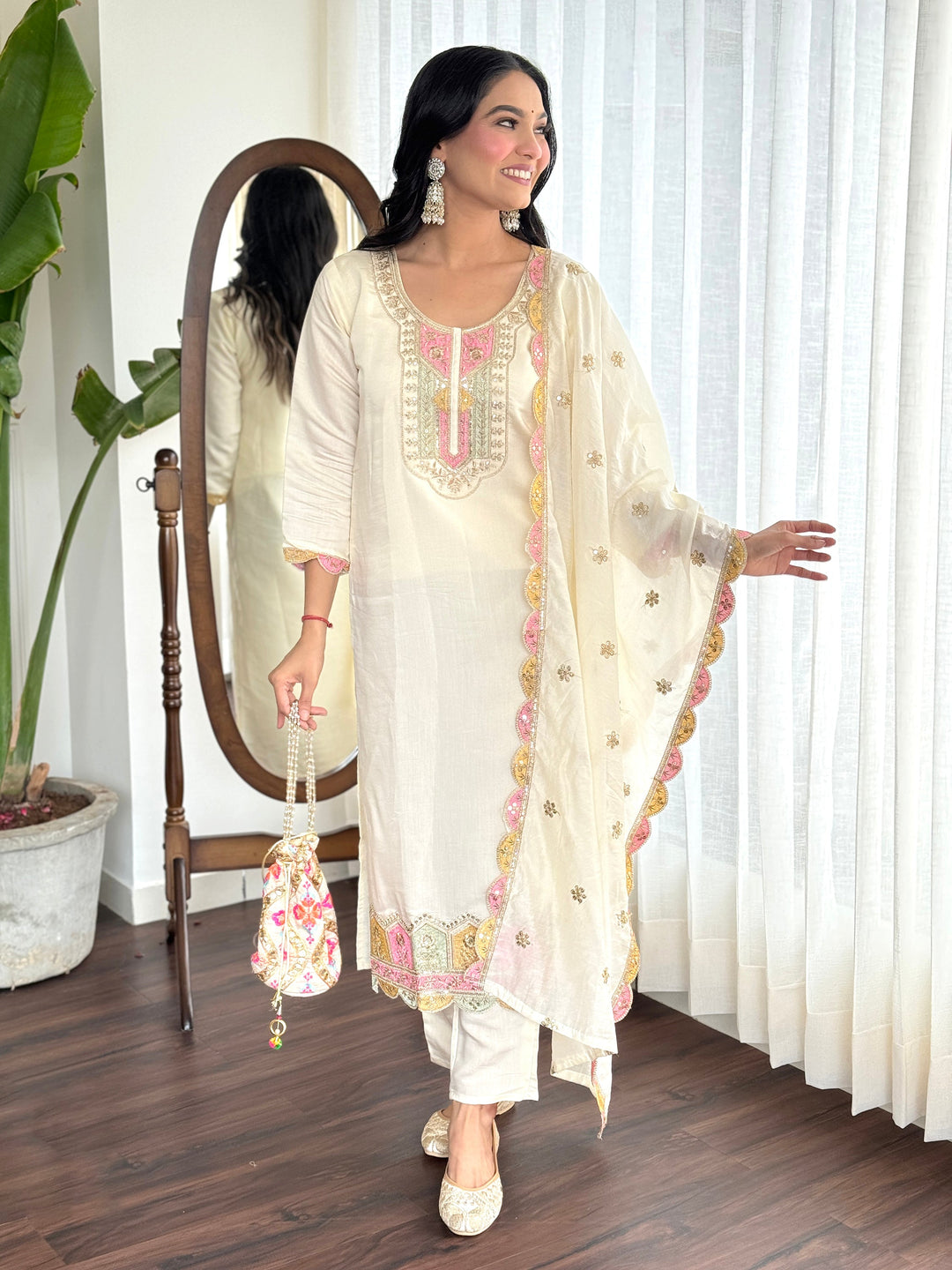 Beautiful cream colored Chanderi Silk traditional pant suit with intricate embroidery
