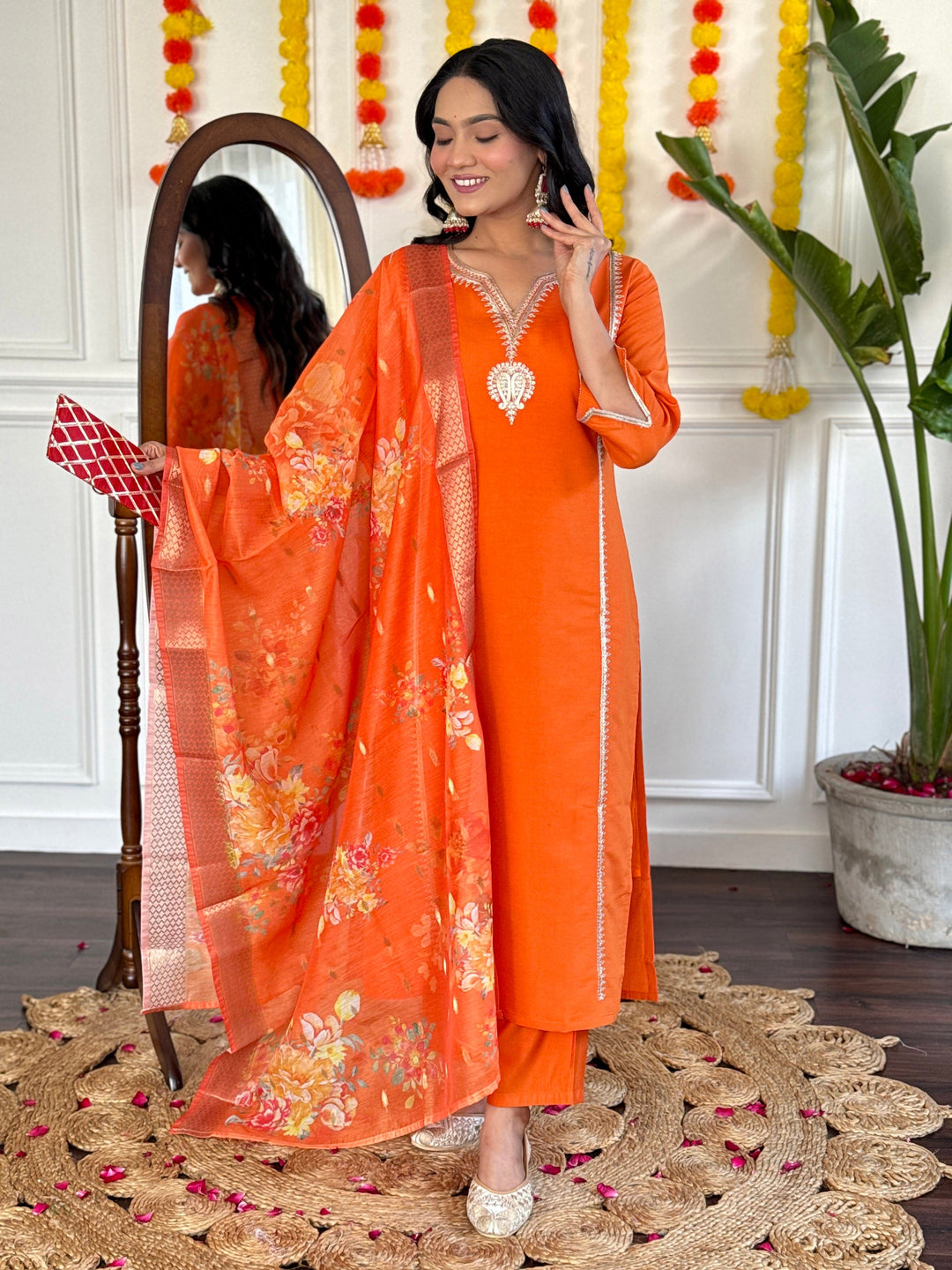 Fully stitched vibrant orange pantsuit with hand-embroidered and sequin work