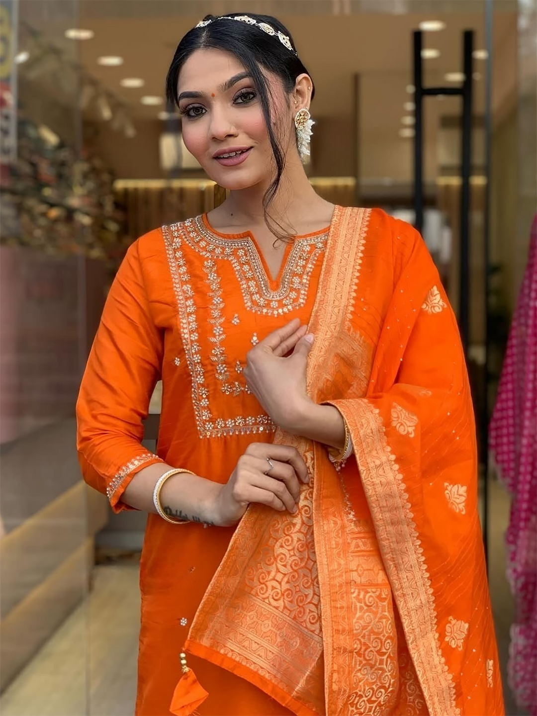 Stunning orange viscose pantsuit with intricate hand-embroidered work and sequin detailing