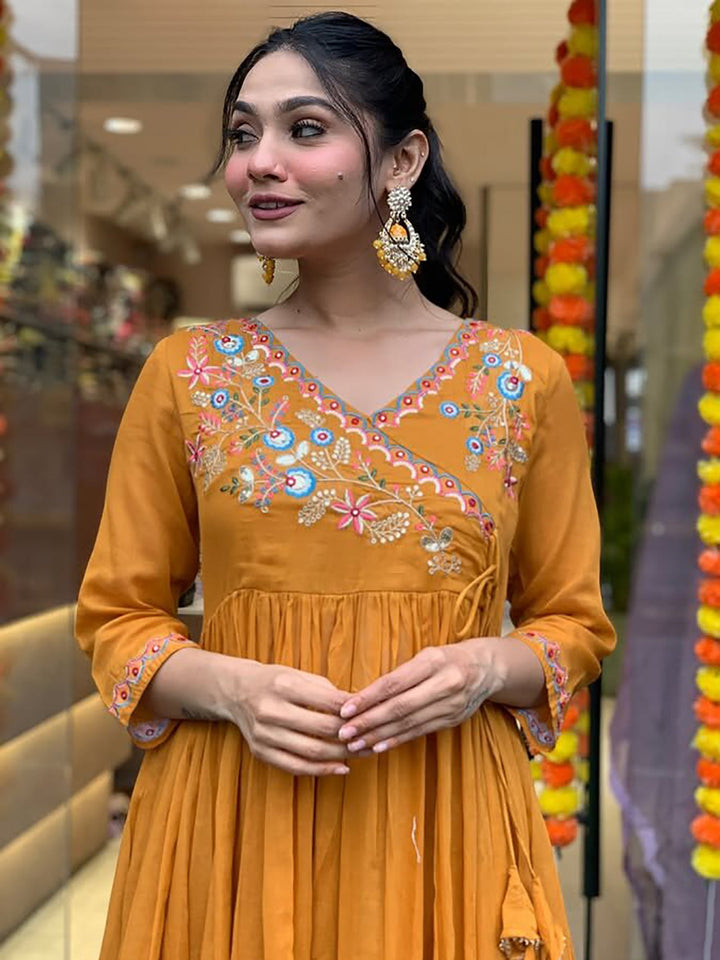 Mustard yellow embroidered pant suit with matching dupatta in viscose fabric