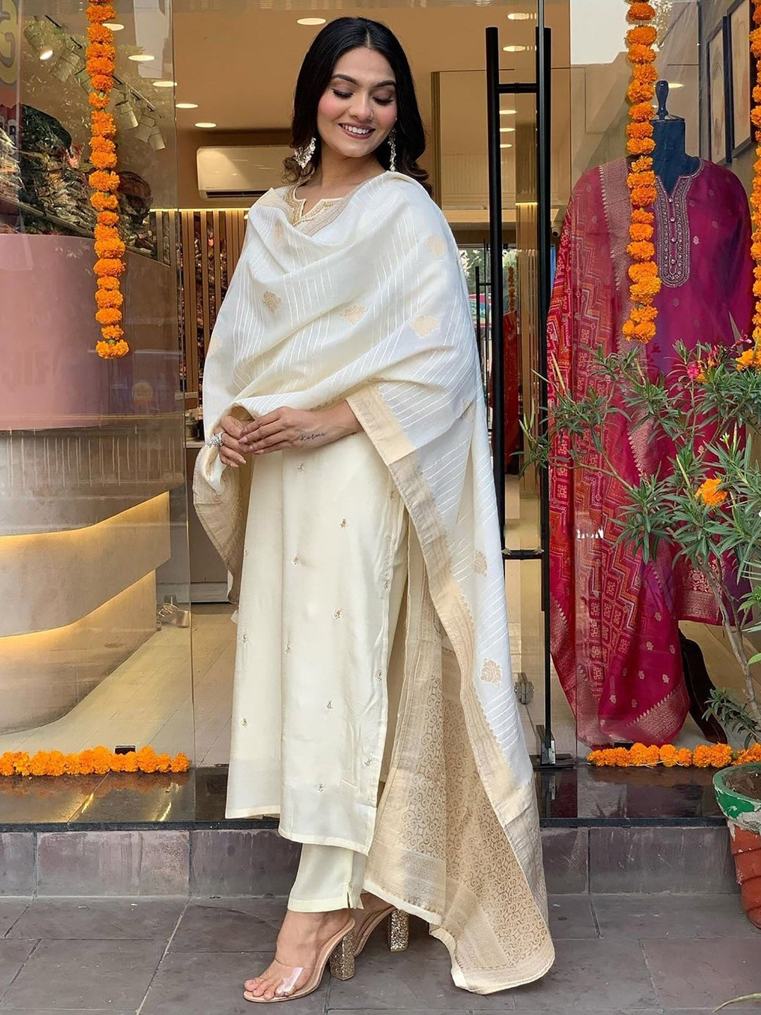 Beautiful off-white embroidered festival wear pant suit with intricate details