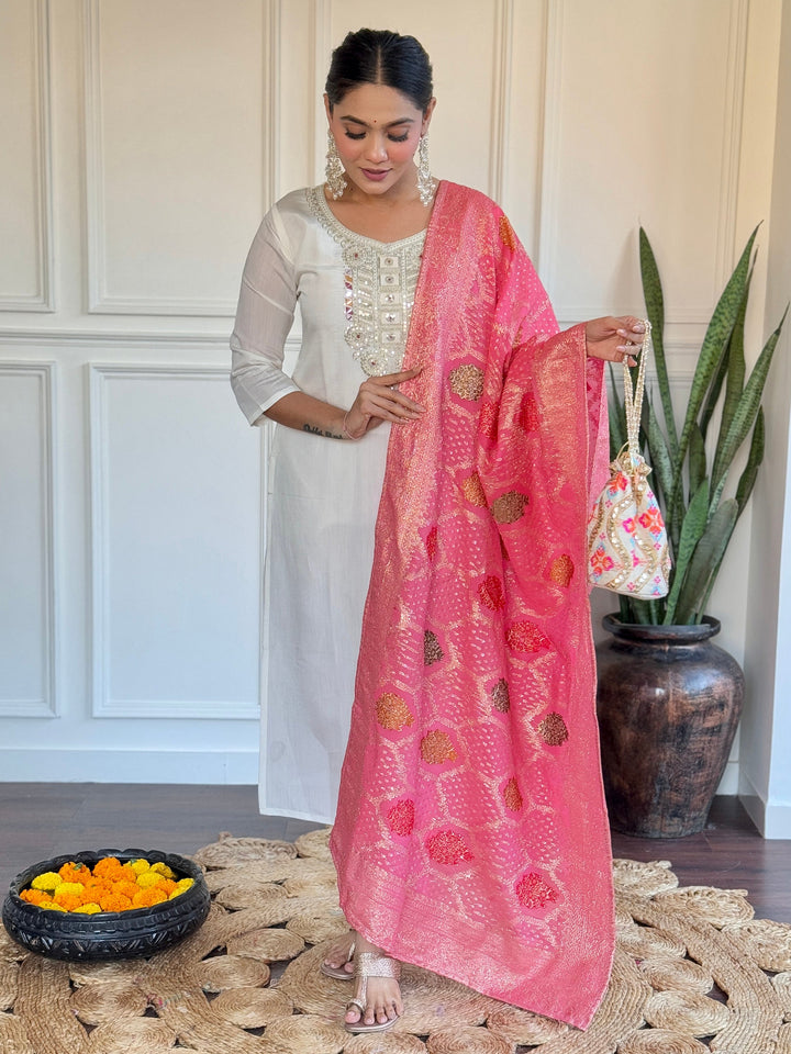 Beautiful off-white embroidered Chanderi traditional pant suit with intricate detailing