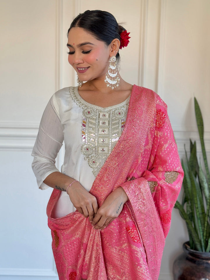 Off-white traditional pant suit with elegant embroidery and Chanderi fabric