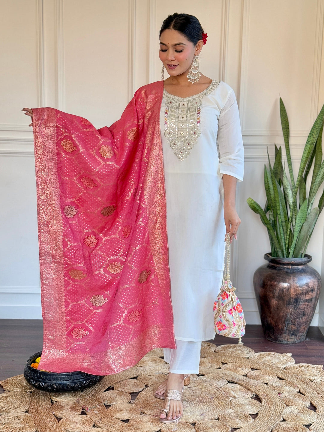 Beautiful off-white embroidered Chanderi traditional pant suit with intricate detailing