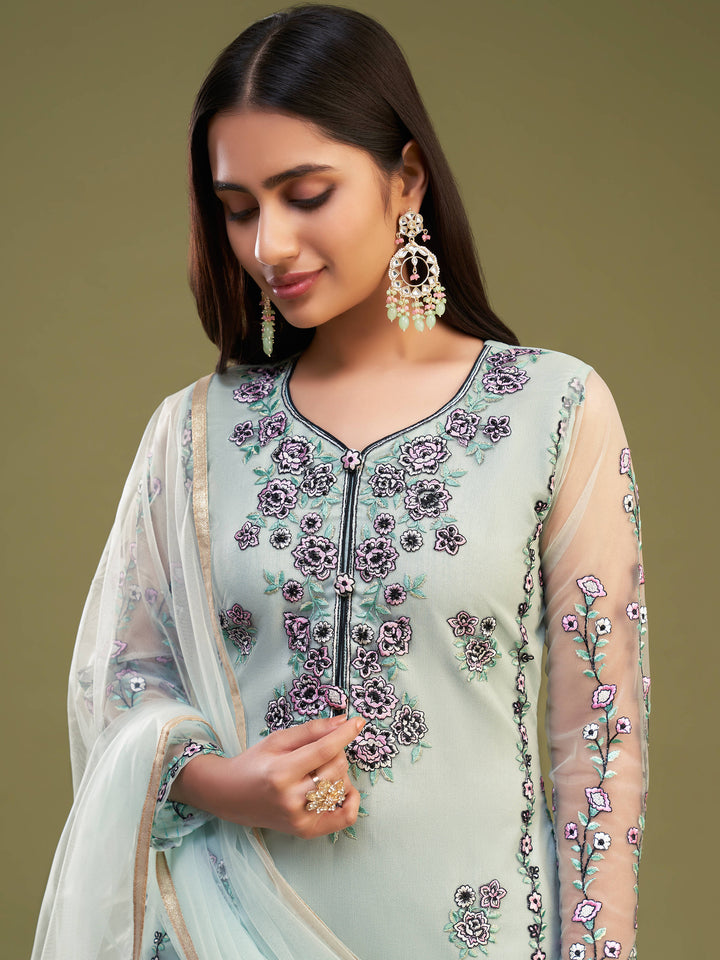 Elegant firozi net salwar suit with intricate multi-thread work and embroidery