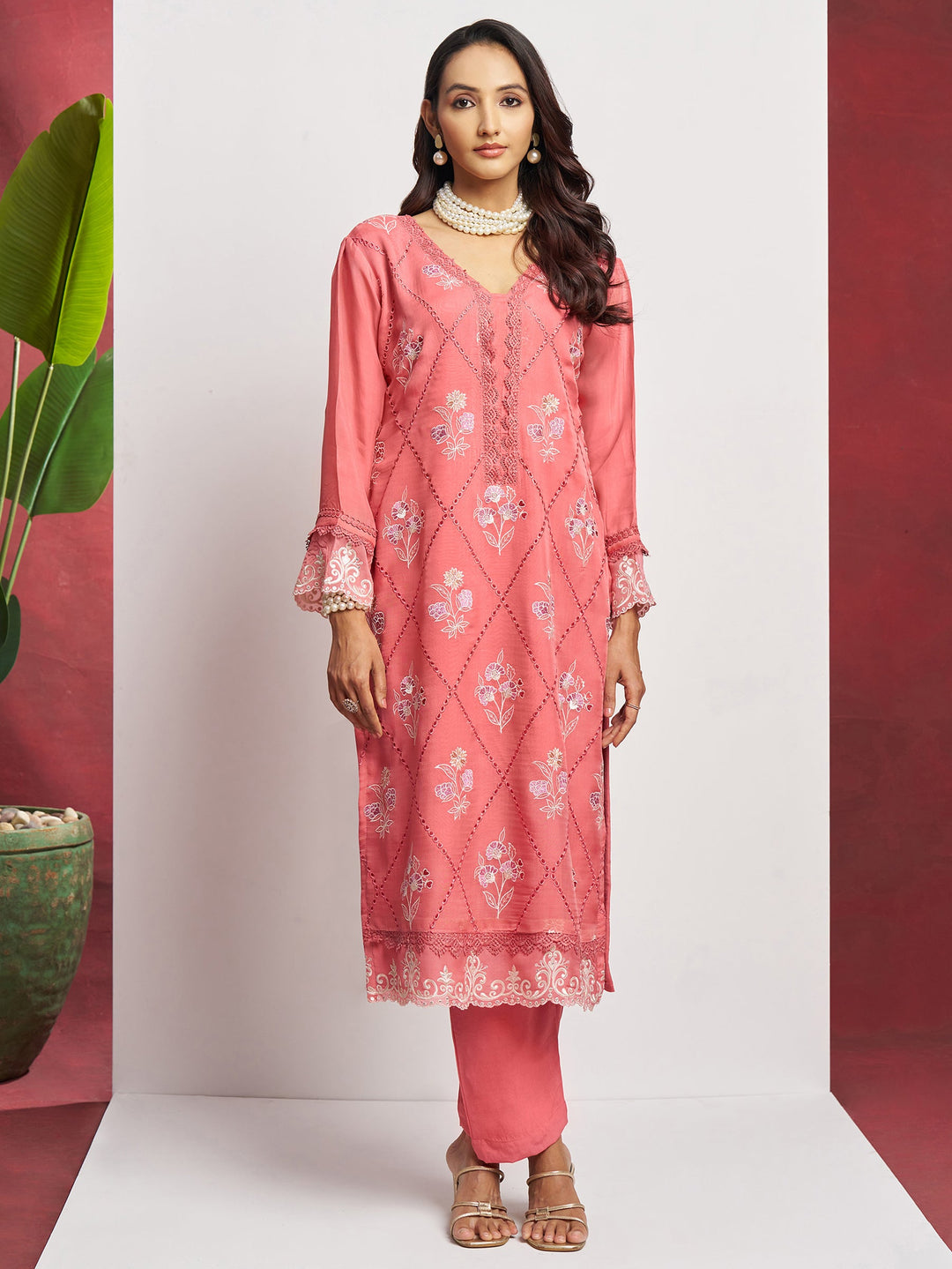 Beautiful peach floral embroidered organza festival wear pant suit with heavy dupatta