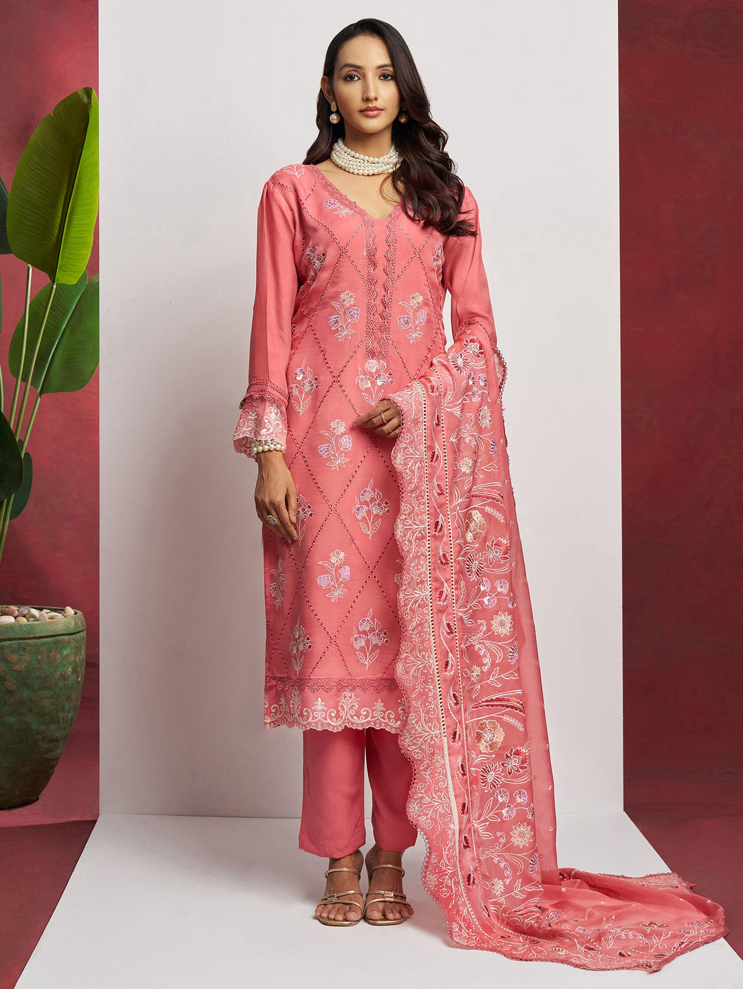 Lovely Peach Floral Embroidered Organza Festival Wear Pant Suit with Heavy Dupatta - Front view of the elegant festival wear pant suit with intricate floral embroidery and a heavy dupatta