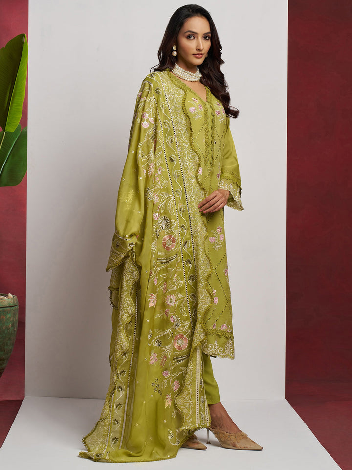 Intricate heavy floral thread embroidery, shimmering sequin work, and delicate lace border