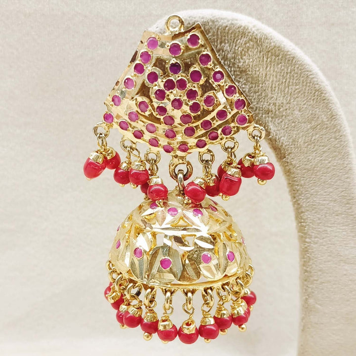 Stunning Gold Plated Jadau Jhumki with Small Ruby Stone Embedded