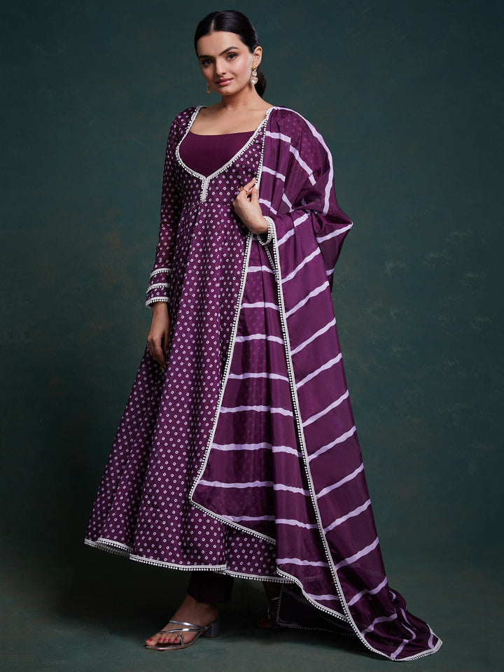 Fascinating purple printed organza festival wear salwar suit with intricate floral designs