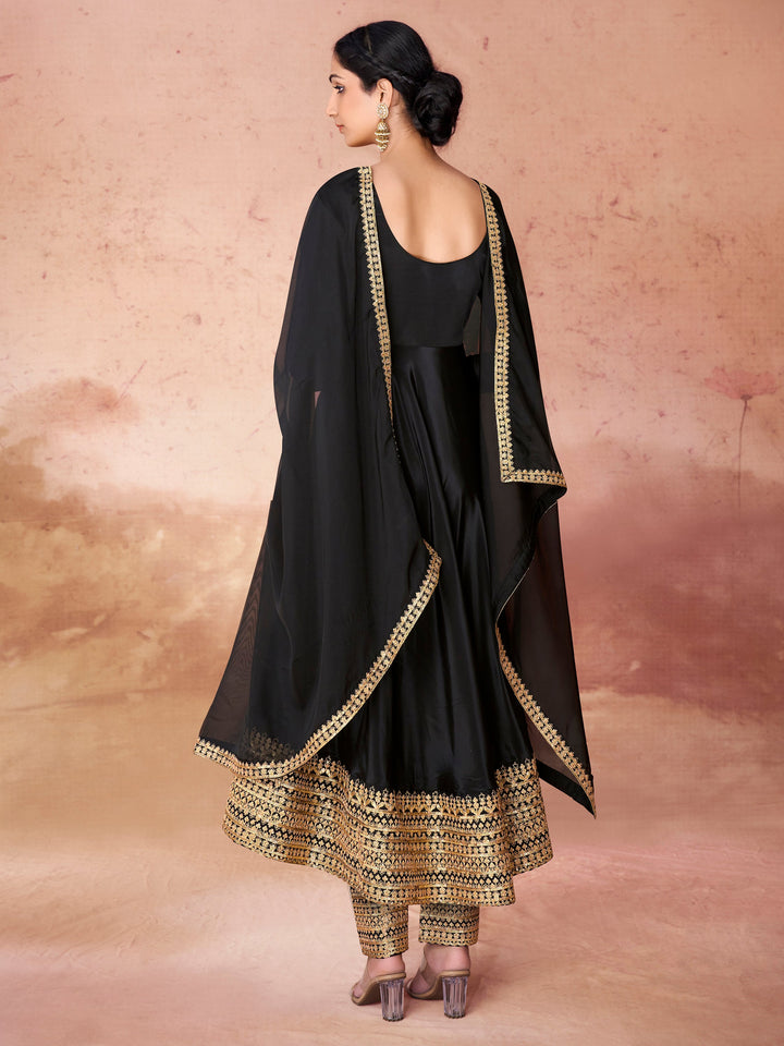 Intricate embroidery and sequin details on the border