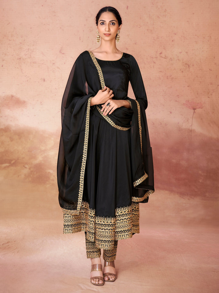 
Black crepe anarkali suit with heavy embroidered borderwork and sequins
