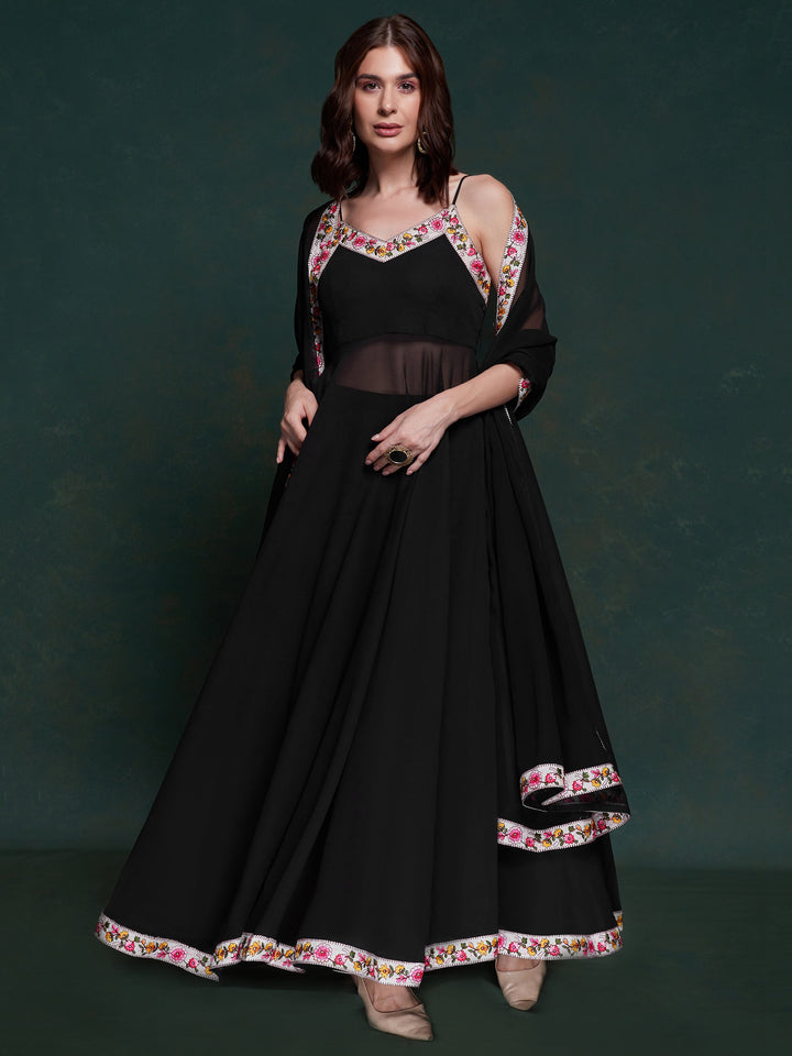 Elegant black georgette long suit with intricate lace work alt text