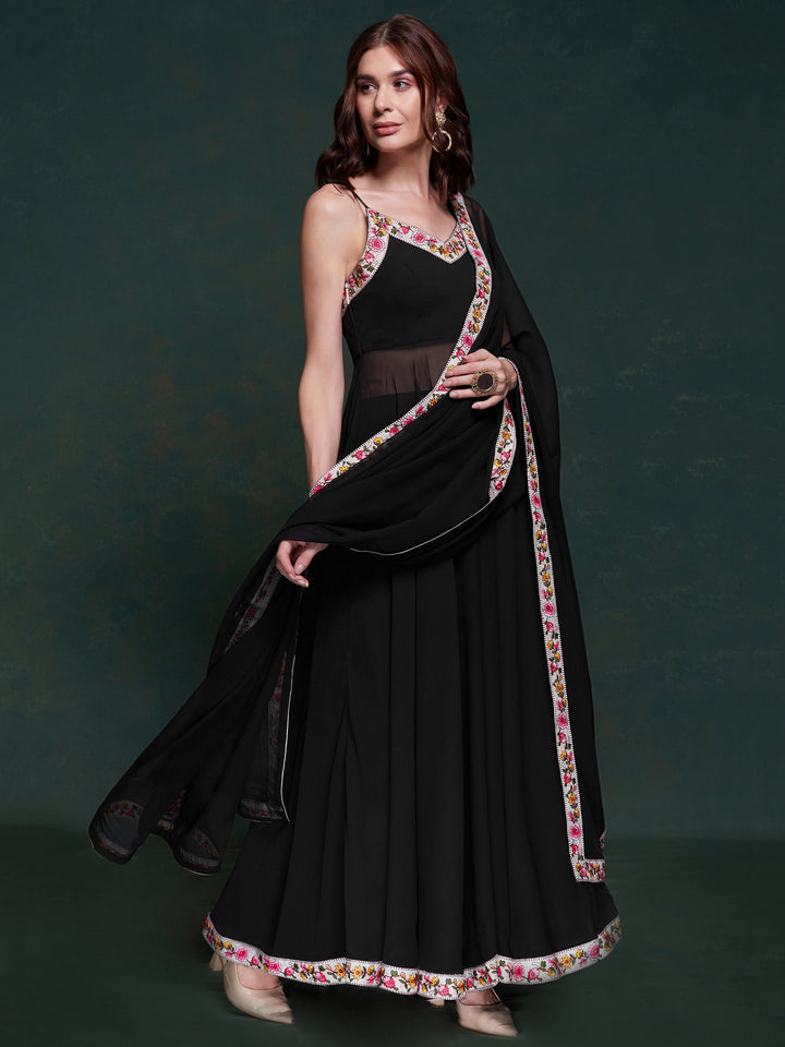 Matching black georgette pants and coordinating dupatta alt text