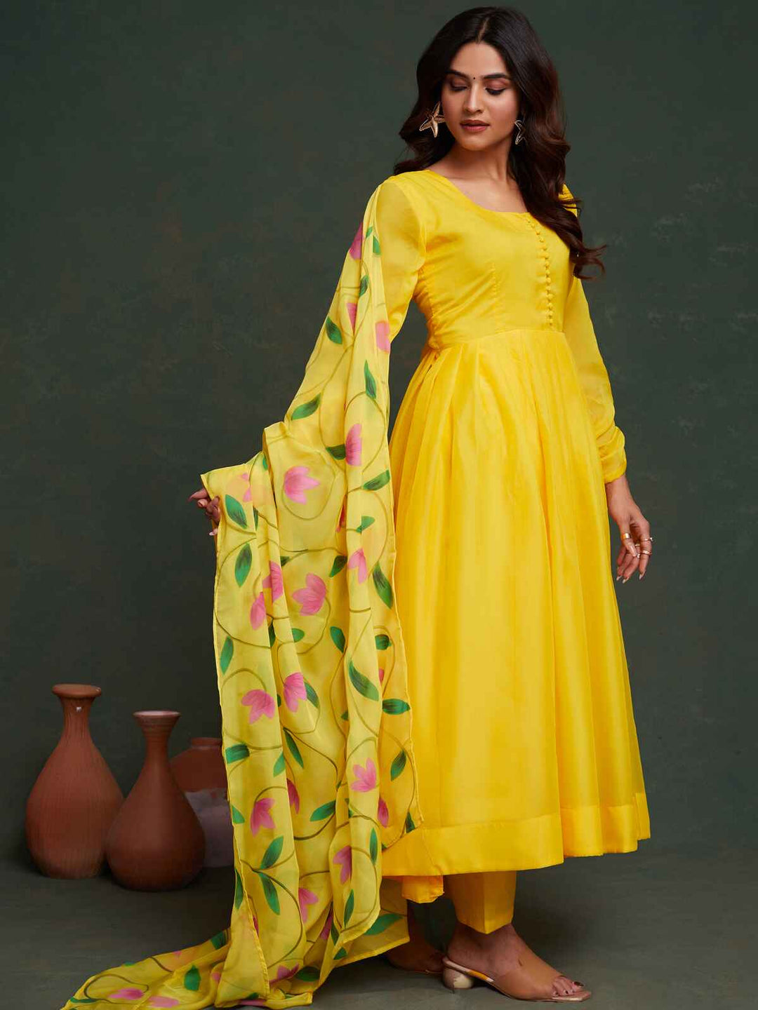Beautiful yellow organza Anarkali suit with dupatta for haldi ceremonies