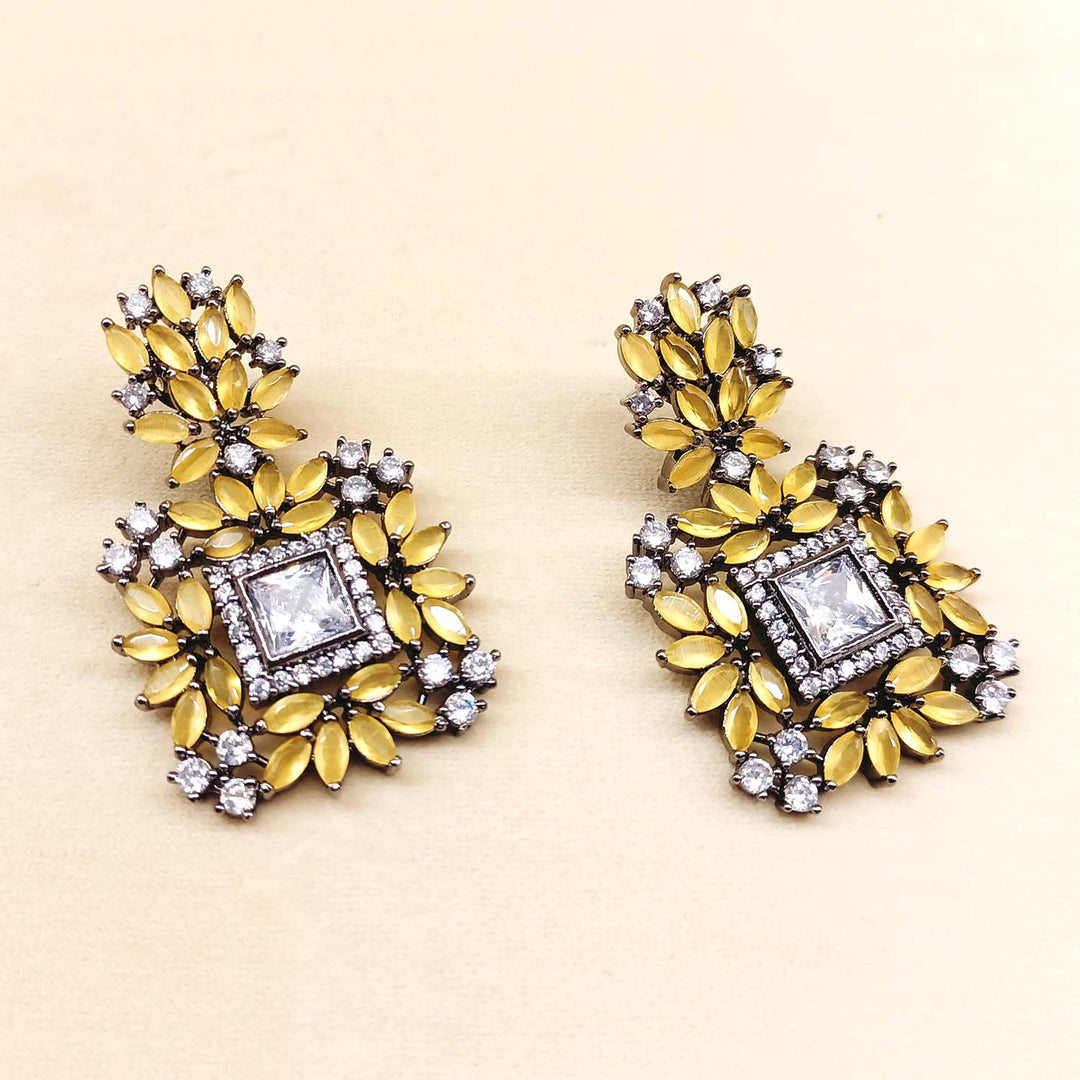 Mustard yellow Victorian earrings with diamond work and rhodium plating