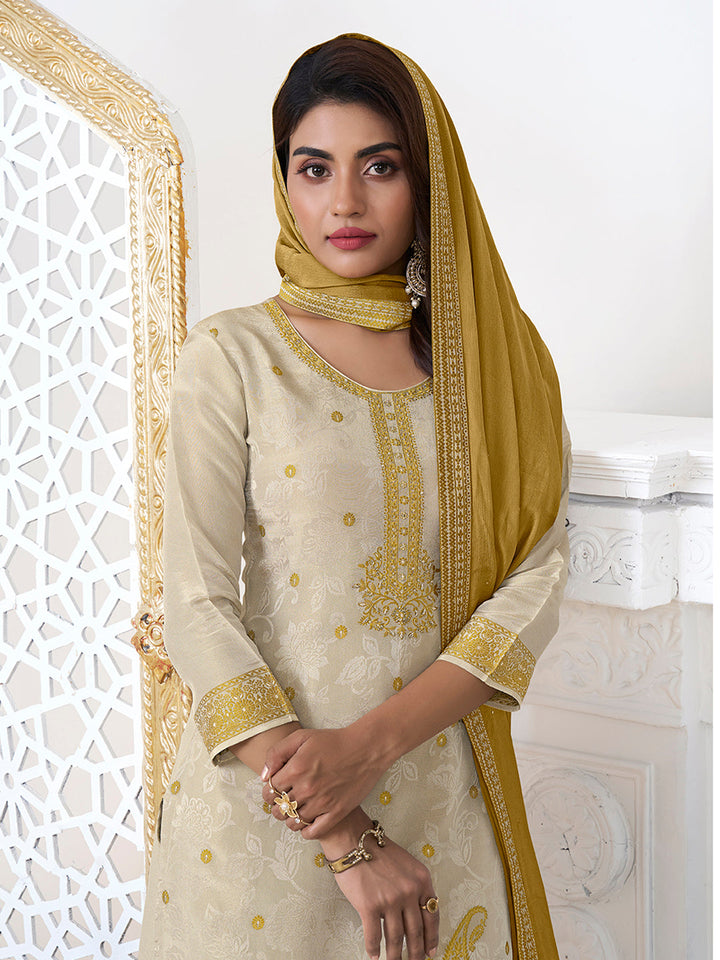 Cream Tissue Embossed Jacquard Kurta Suit Set with Yellow Contrast Dupatta. - qivii