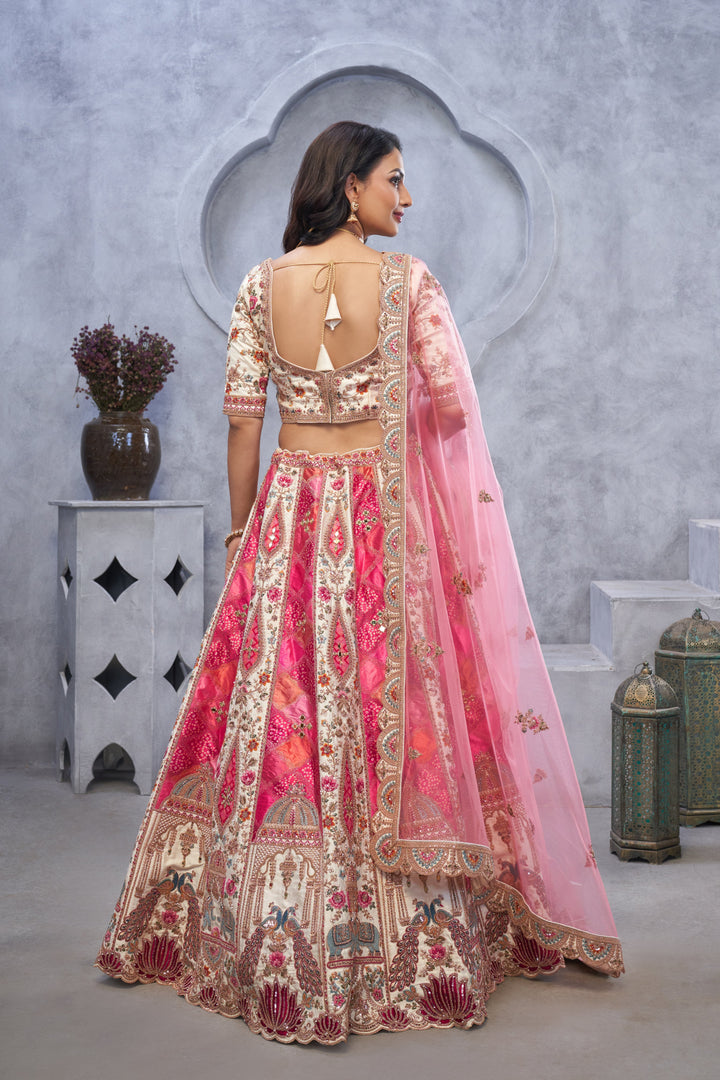 Bridal Lehenga with Temple Motifs, Peacock Embroidery & Bandhej Jacquard Patches - qivii