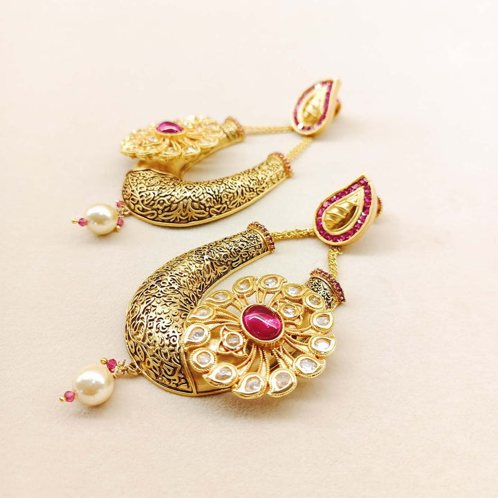  Stunning danglers with kundan stones and pearl drops