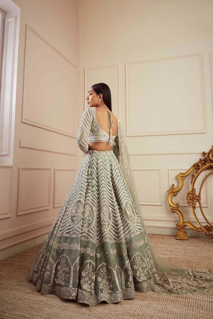 Green Georget lehnga with heavy sequence, dori & zari work - INSPIRED | Ready To Wear - qivii