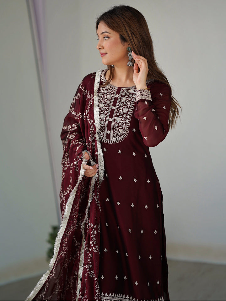Maroon silk pant suit with intricate thread work and matching dupatta
