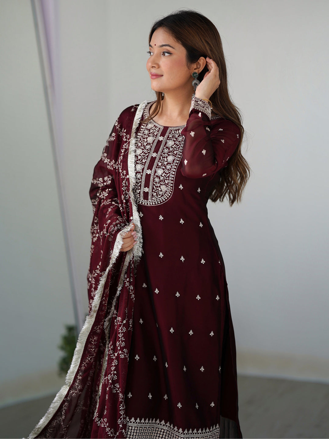 Maroon silk festival wear pant suit with intricate thread work and matching dupatta