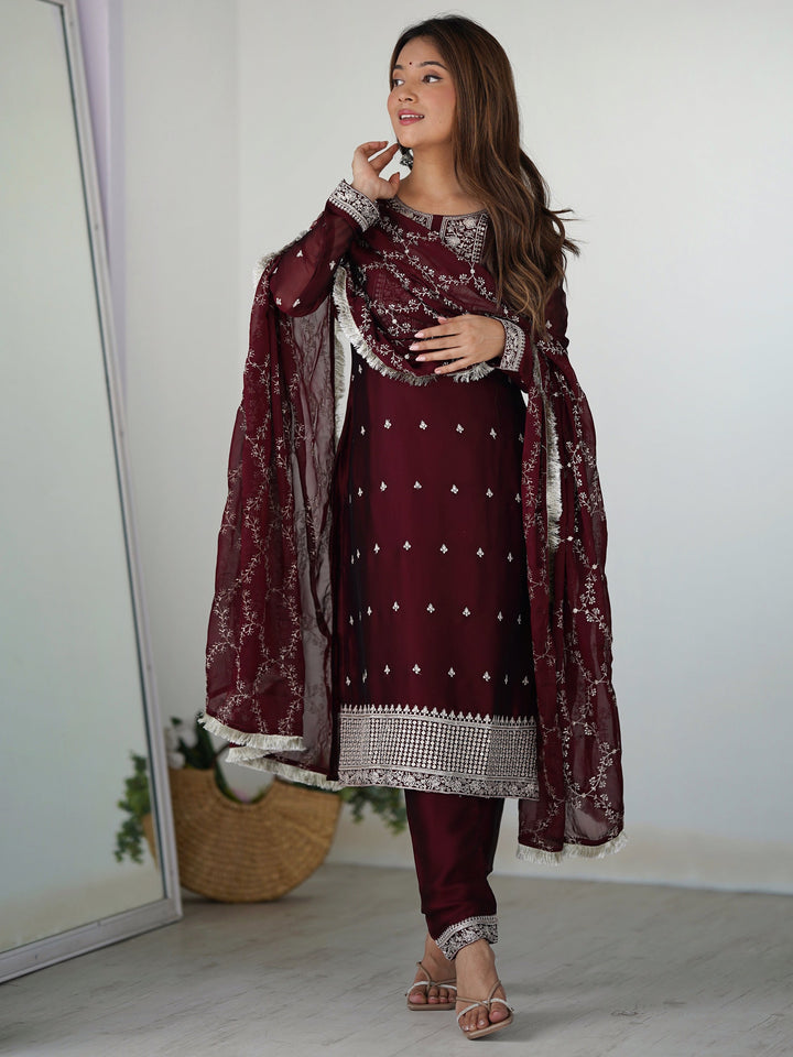 Maroon silk pant suit with intricate thread work and matching dupatta for festivals
