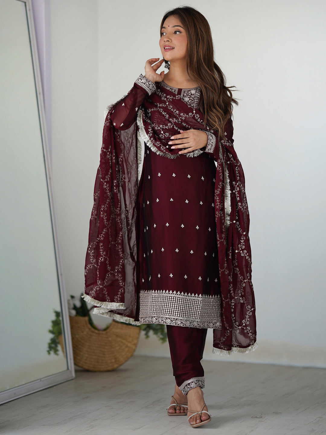 Maroon silk pant suit with intricate thread work and matching dupatta