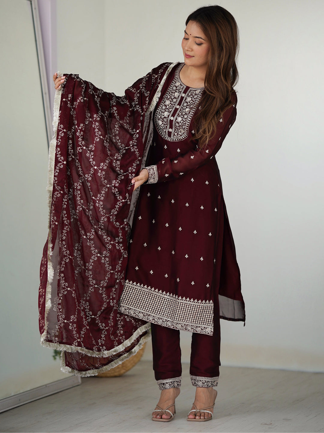 Maroon silk pant suit with intricate thread work and matching dupatta