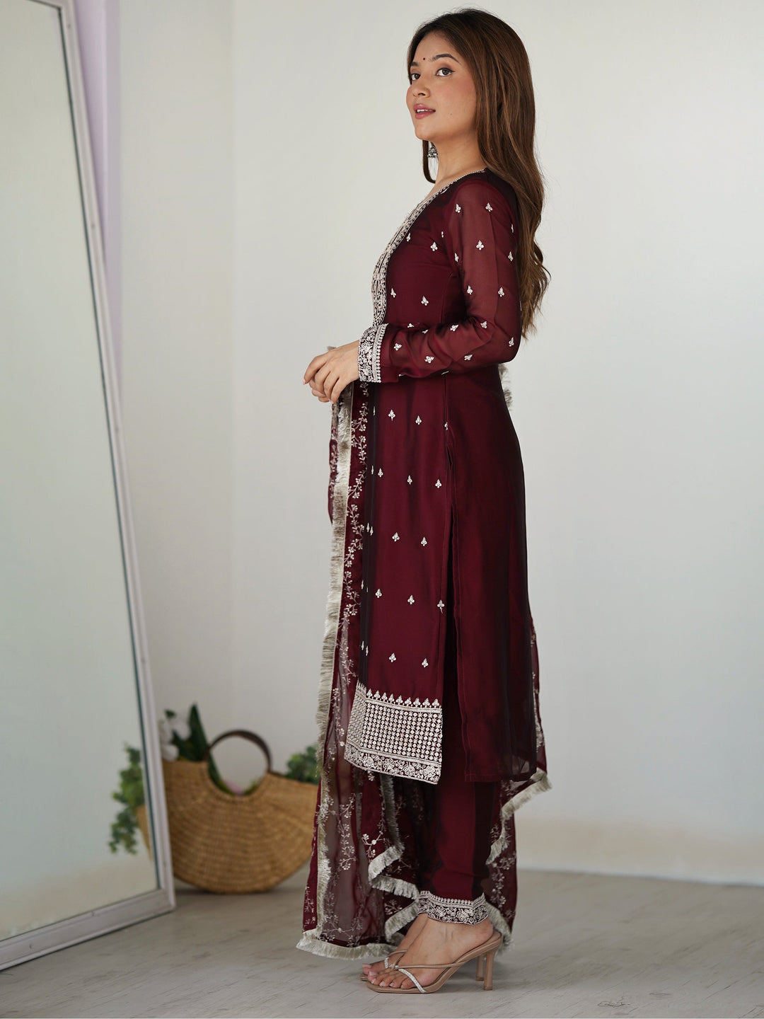 Maroon silk pant suit with intricate thread work and matching dupatta