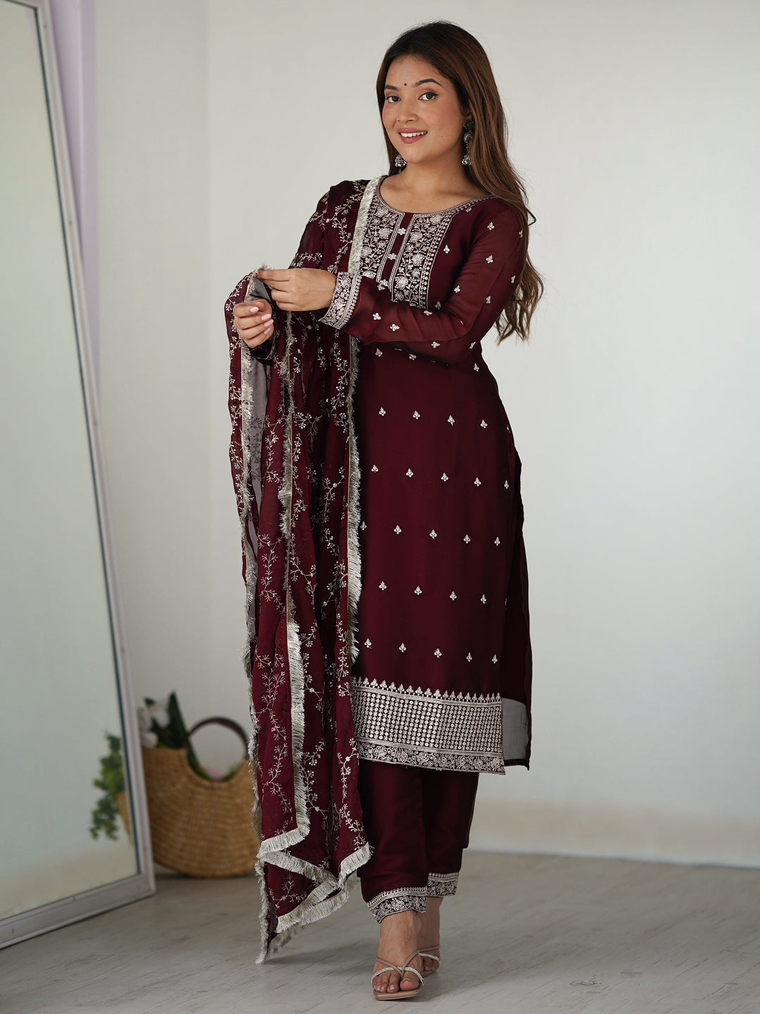Maroon silk festival wear pant suit with intricate thread work and matching dupatta